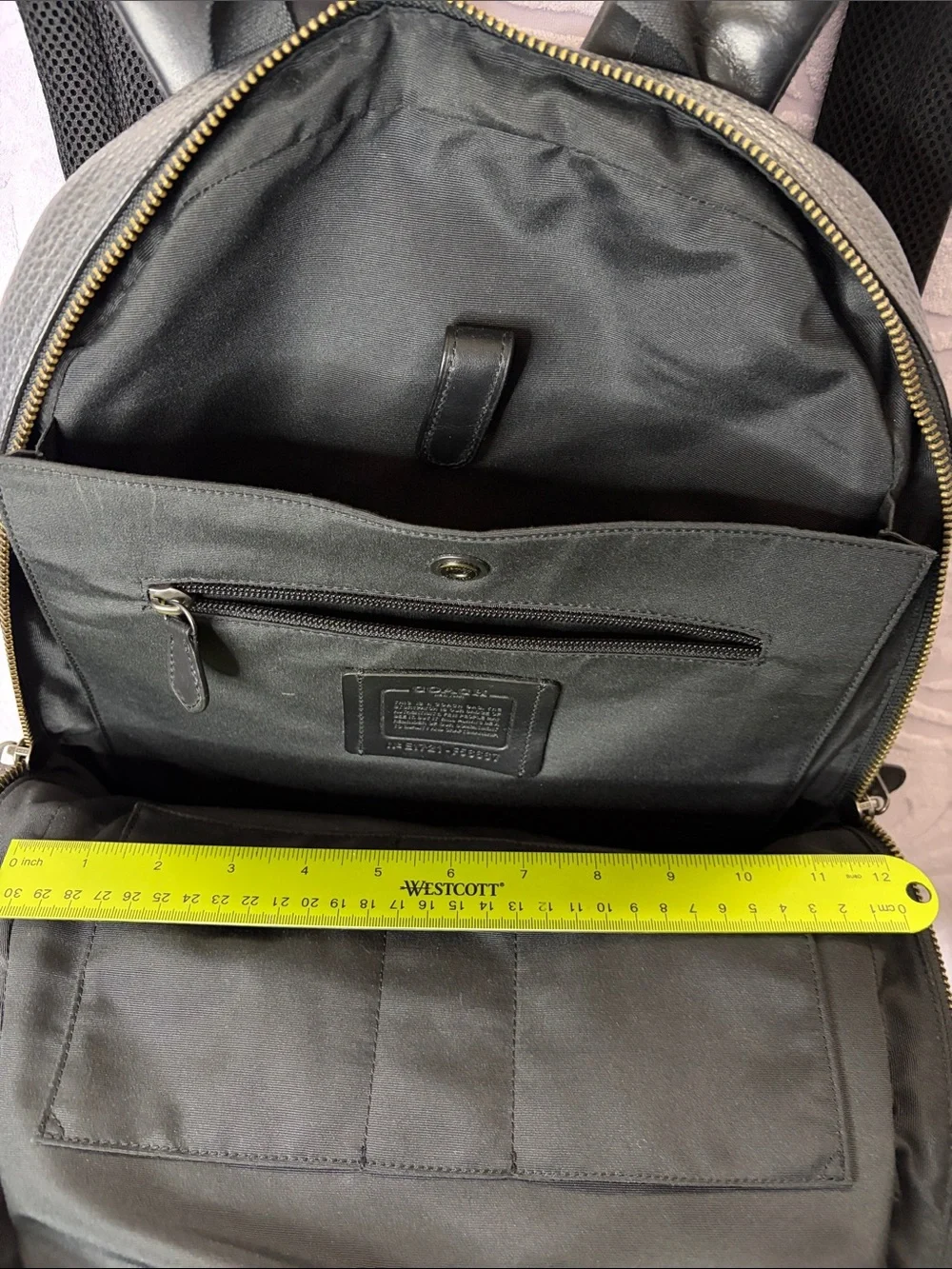 Coach Black Pebbled Leather Backpack with Front Pocket and Stripe Detail